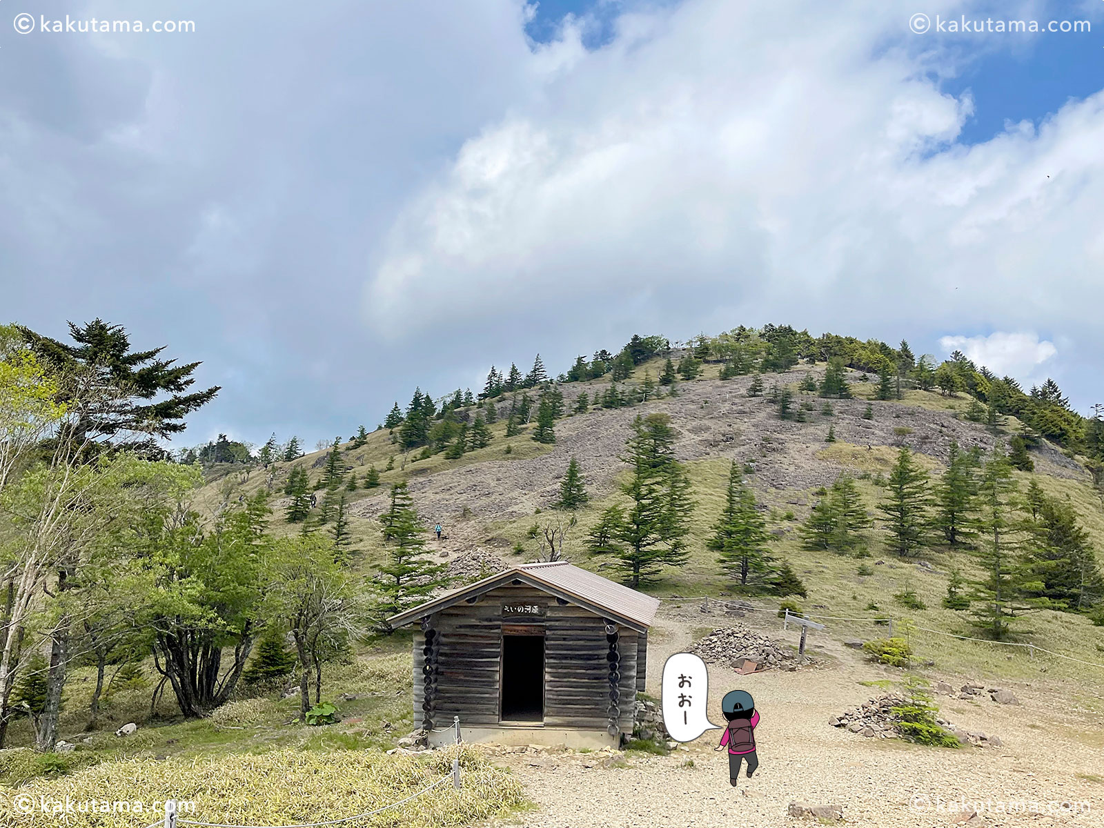 大菩薩峠の賽ノ河原の写真と登山者のイラスト