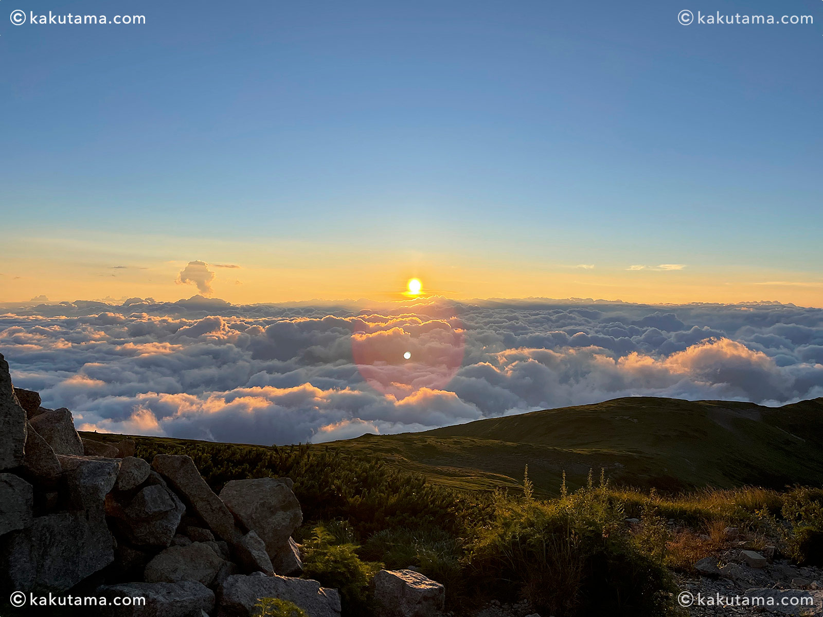 北アルプス、薬師岳山荘から見た夕日風景の写真