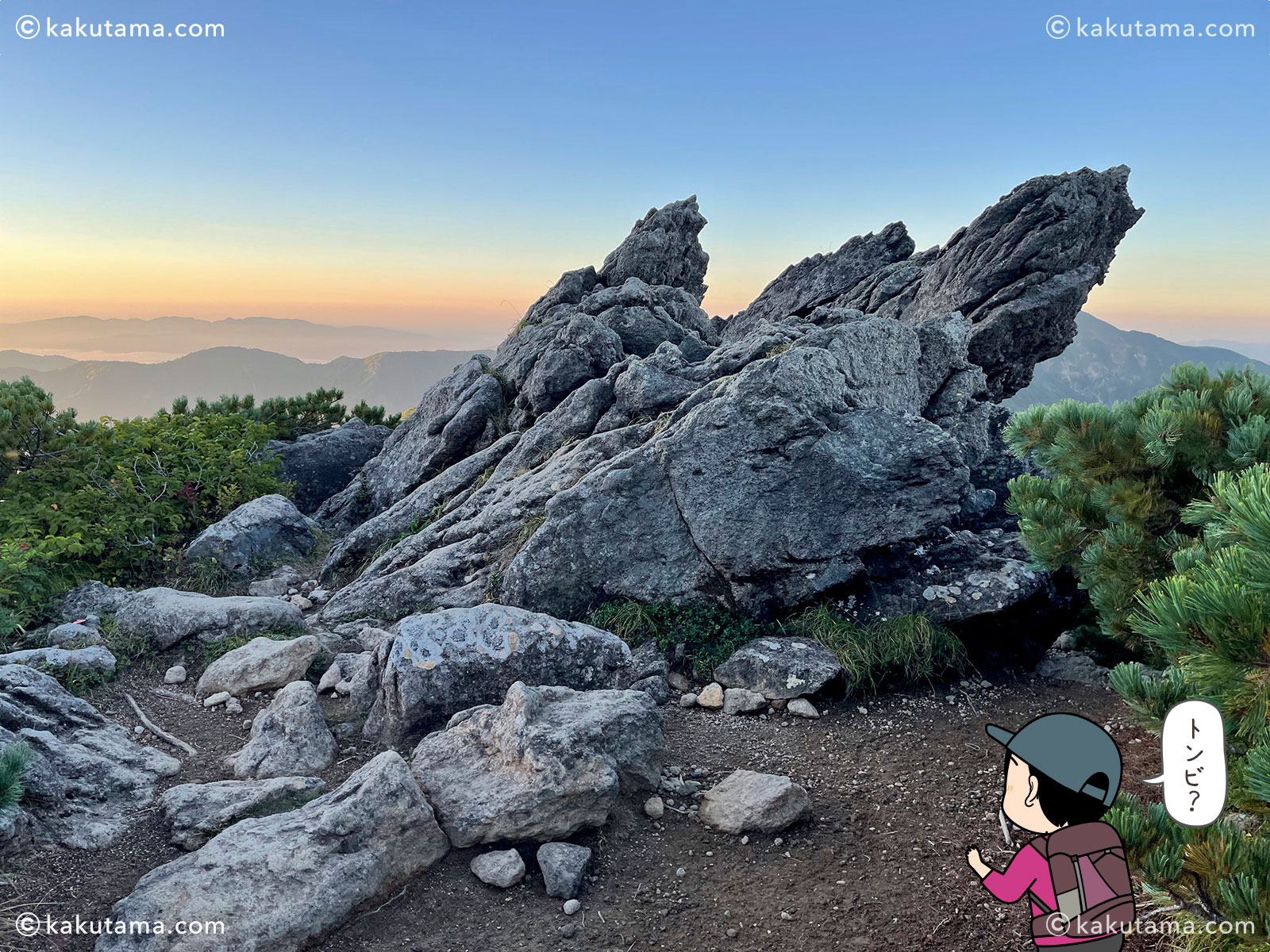 石川県・白山のトンビ岩コースのトンビ岩の写真と登山者のイラスト
