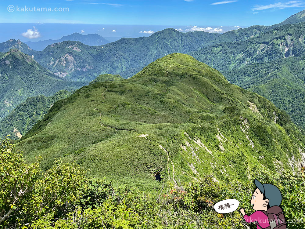 雨飾山の女神の横顔の写真と登山者のイラスト